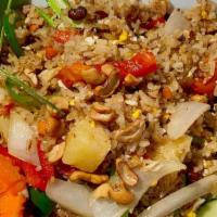 Pineapple Fried Rice · Pineapple, red and green bell peppers, cashews.
