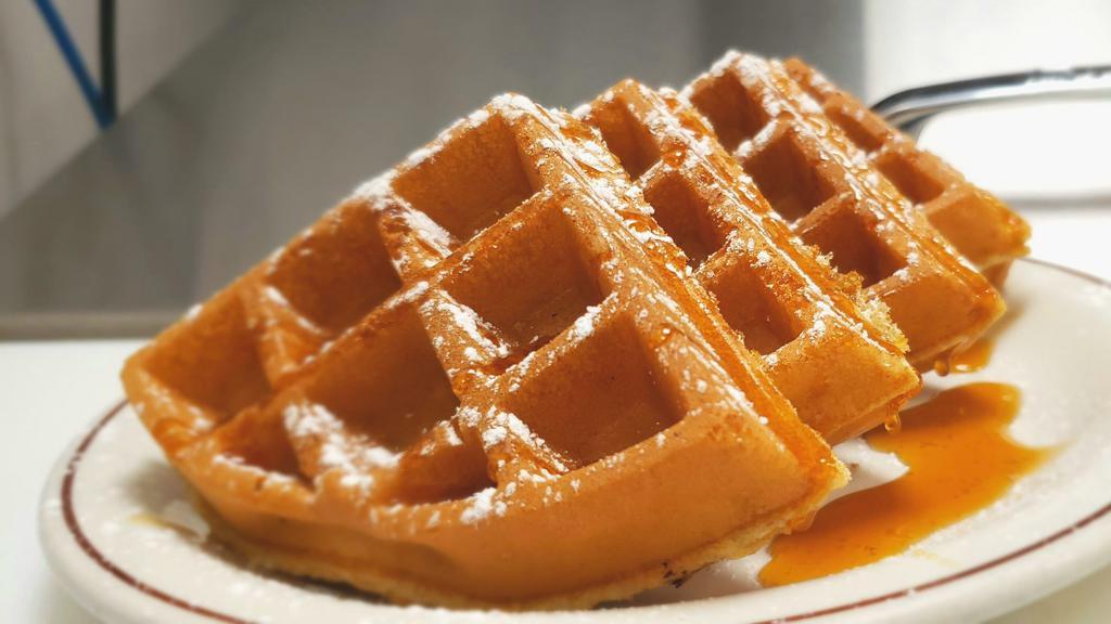 Waffle · Belgian Waffle with syrup and butter on the side