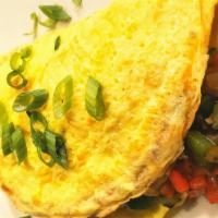 Omelette · Eggs, bell pepper, onions, mushrooms, spinach and melted cheese with a side of salsa.