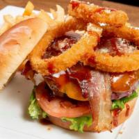 Bbq Bacon Burger · Bacon, cheddar cheese, bbq sauce, onion ring, lettuce, tomato.