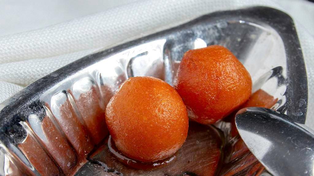 Gulab Jamun(2) · A North Indian sweet made mixture of flour and milk, fried in soybean oil, soaked in honey syrup.