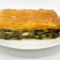 Side Spanakopita · Layers of spinach and feta cheese baked in filo dough.