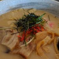 Tonkatsu Ramen · Includes pork belly, bamboo shoots, fish cake, green onions, bean sprouts, pickled red ginge...