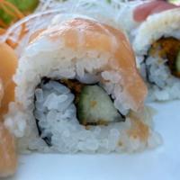 Rainbow Roll · Inside: masago and cucumber outside: yellowfin tuna, yellowtail jack, salmon, whitefish, Shr...