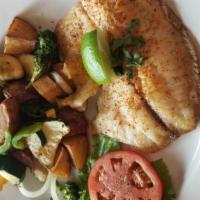 Baked Tilapia · Tilapia with lemon butter. Served roasted bell peppers, onions, potatoes wedges, zucchini, a...