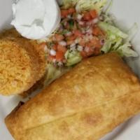 Mini Chimichanga · One mini chimichanga with chicken or ground beef and cheese served with Mexican rice.