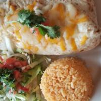 Burrito Grande · Flour tortilla filled with black bean cream, cheese and choice of ground beef, chicken, stea...