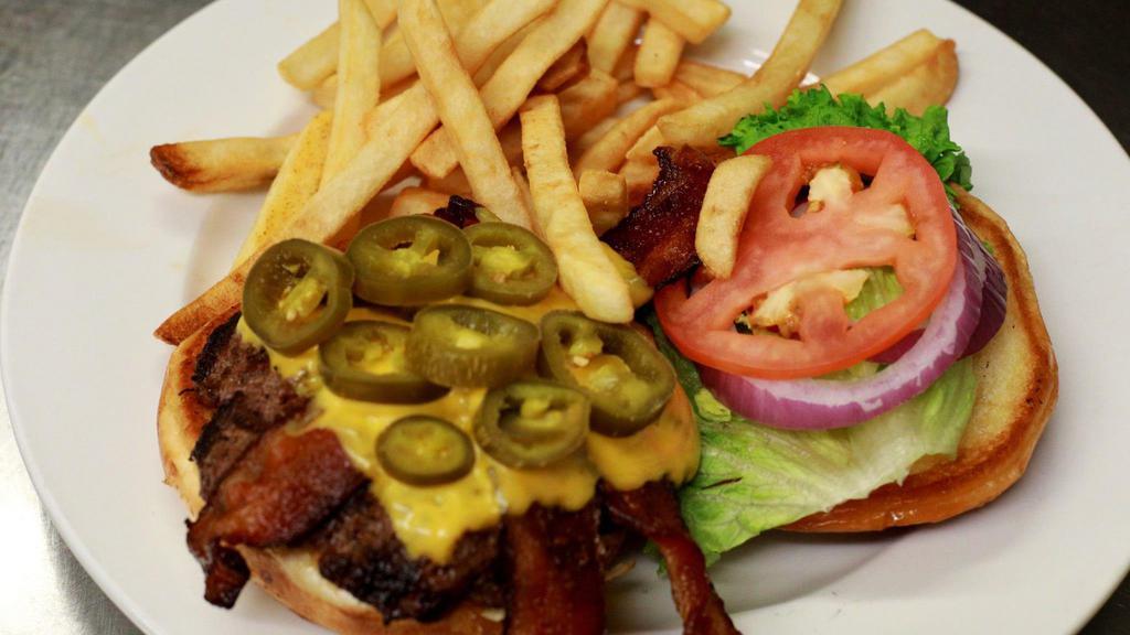 Jalapeño Cheeseburger · 1/2 lb hamburger patty with cheddar cheese, tomatoes, onions, lettuce, jalapenos and french fries.
