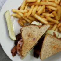 Blt · Crispy bacon, avocado, lettuce, tomatoes, wheat toast and french fries.