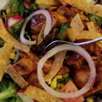 Southwest Chipotle Salad · Grilled chicken, spring mix, corn, black beans, tomatoes, radishes, cucumbers, tortilla stri...