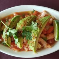 Ceviche · Fresh pickled shrimp, tomatoes, onions, cilantro, avocado, hot sauce served with tortilla ch...