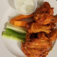Chicken Wings (10 Pc) · Mild, hot, thai chili, honey BBQ or BBQ, served with celery and carrot sticks, ranch or bleu...