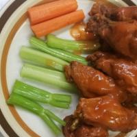 Chicken Wings (6 Pc) · Mild, hot, thai chili, honey BBQ or BBQ, served with celery and carrot sticks, ranch or bleu...