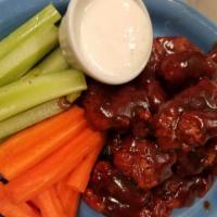 Boneless Chicken Wings (20 Pc) · Mild, hot, thai chili, honey BBQ or BBQ, served with celery and carrot sticks, ranch or bleu...