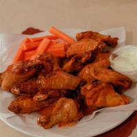 Chicken Wings (20 Pc) · Mild, hot, thai chili, honey BBQ or BBQ, served with celery and carrot sticks, ranch or bleu...