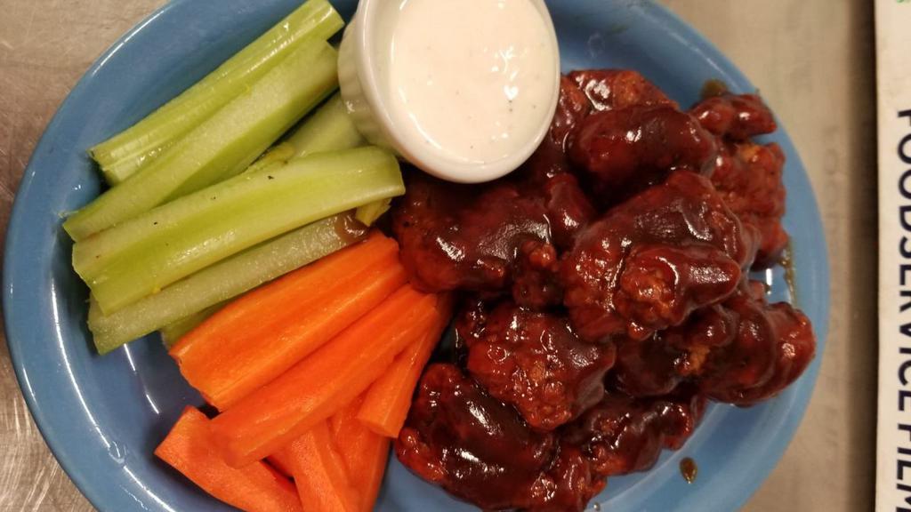 Boneless Chicken Wings (10 Pc) · Mild, hot, thai chili, honey BBQ or BBQ, served with celery and carrot sticks, ranch or bleu cheese.
