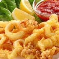 Fried Calamari · An old favorite, served with tangy tomato sauce.