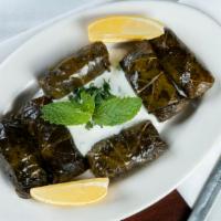 Stuffed Grape Leaves (6Pc) · Grape leaves stuffed with rice, nuts and vegetables. Vegan.