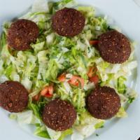 Falafel Plate · Six pieces deep-fried patties of ground chickpeas, vegetables and spices. Served with tahini...