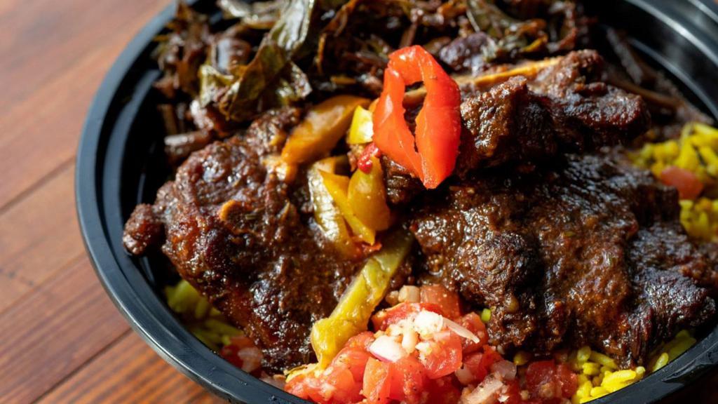 Jerk Oxtail With Rice & Truffle Oil Greens · Our jerk style halal oxtail served with rice and truffle oil greens.