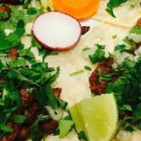 #6 - Street Tacos · Four Tacos, Choice of Meat, Onions, Cilantro, Rice, and Beans