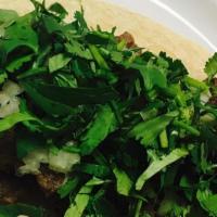 Street Taco · Corn Tortilla, Choice of Meat, Onions, and Cilantro