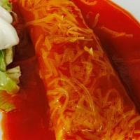 Enchilada · Choice of Chicken, Beef, or Cheese and Onions, Enchilada Sauce, Shredded Cheese, and Sour Cr...