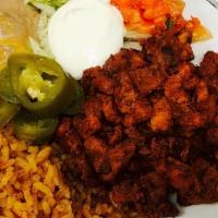 Adovada Platter · Adovada (BBQ Pork), Rice, Beans, Sliced Jalapeños, Guacamole, Sour Cream, Pico de Gallo, and...