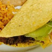 Kid'S Hard Shell Taco Meal · Hard Shell Taco, Chicken or Ground Beef, Lettuce, Cheese, Rice, and Beans