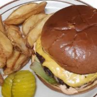 The Ultimate Super George Burger · 1/3 pound. Melted American cheese, fresh lettuce, and thousand island dressing. Served on a ...