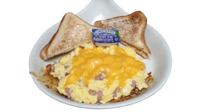 Ham Scrambler · Eggs scrambled with ham and topped with melted American cheese.