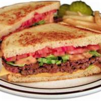 Sourdough Boy Combo · Sourdough bread, two beef patties with American cheese, fried onions, lettuce, tomato, and t...