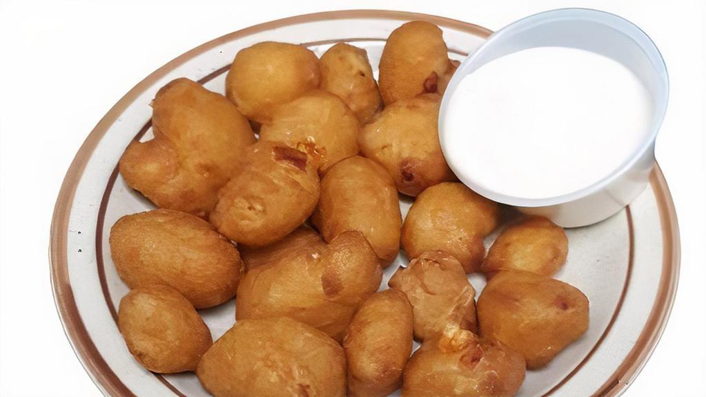 Crispy Cheese Curds · Recommended. Real Wisconsin white cheddar cheese curds.