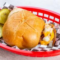 Not-So-Sloppy-Joe · Comes with cheese, onion, pickles in a toasted kaiser roll.
