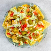 Nacho Plate · Seasoned ground beef & cheese. Choice of lettuce, tomato, onion, jalapeño, grated or melted ...