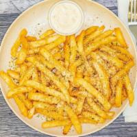Truffle Parmesan Fries · Extra Crispy Battered Fries Tossed in Truffle Oil and Parmesan Cheese, Parsley Flake Sprinkle