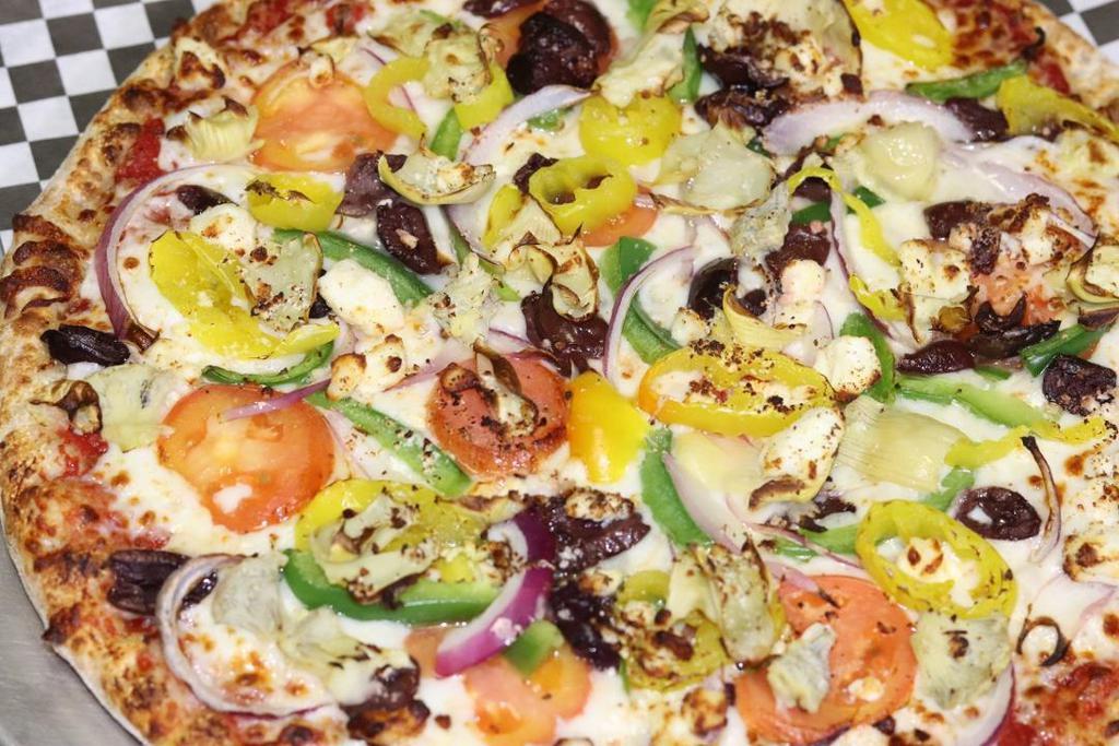Greek Veggie Pizza · Tomato Sauce, Feta Cheese, Artichoke Hearts, Red Onions, Kalamata Olives, Green Peppers, Tomato, Banana Pepper Rings, Oregano Flakes, Cheese