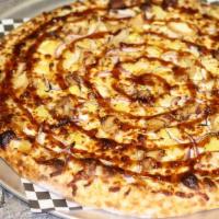Teriyaki Tender Pizza · Teriyaki Ranch Sauce, Crispy Chicken Bits, Red Onions, Pineapple, Cheese, Teriyaki Drizzle