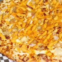 Chipotle Tender Pizza · Chipotle Ranch Sauce, Crispy Chicken Bits, Red Onions, Cheddar Cheese, Cheese, Chipotle Driz...