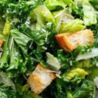 Romaine Caesar Salad · Hearts of romaine, croutons and wisconsin parmesan.