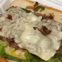 Philly Cheesesteak · Thinly sliced steak, Swiss cheese, grilled onions, grilled green peppers, mayo, tomatoes, le...