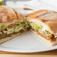 Tortas · All tortas are topped with lettuce tomato onion avocado beans & sour cream.