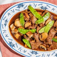 Beef With Snow Peapods · sliced beef sauteed with snow pea pods and water chestnuts in brown sauce.