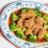 Sesame Chicken · Chunk chicken sauteed in special sweet sauce on top of bed of broccoli. A must try.