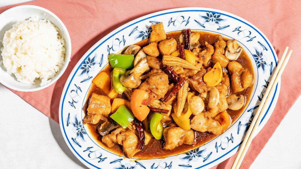 Hunan Chicken · Diced chicken sauteed with green and red peppers and baby corns in chili spicy sauce.