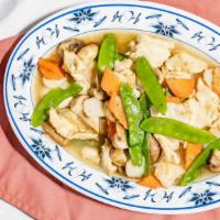 Chicken With Snowpeas · Sliced chicken white meat sauteed with snow pea pods in white wine sauce.