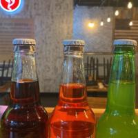 *Excel Soda · Many craft sodas to choose from. Made locally in Illinois, served in a traditional glass bot...