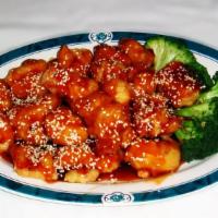 Sesame Chicken · Spicy. Chicken stir-fried with carrots, celery, broccoli, green peppers, and onions in a Sze...