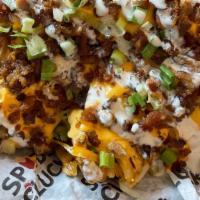Phillip Bank Loaded Fries · Bacon, house blend cheese, green onions with your pick sour cream or ranch.