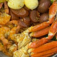 Yummy  Combo1磅蟹1磅虾半磅香肠10芥兰2蛋2玉米4土豆 · 1 Lb  Snow Crab+1 Lb  Shrimp No Head+1/2 Lb Sausage+10 Pc Broccli+2 Egg+2 Corns+4 Potatoes
